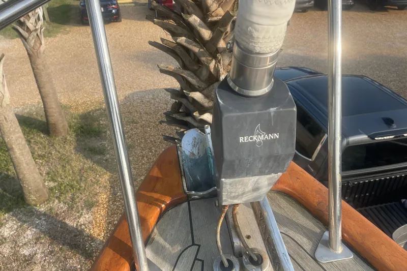 Slide: The Image of Close-up of Reckmann equipment on 1972 Rhodes 53 Motorsailor deck, with palm trees in background. - 27
