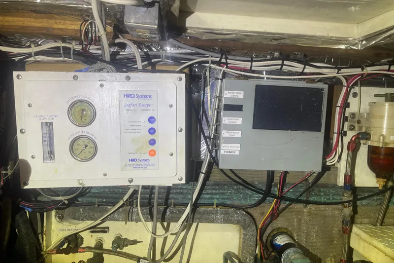 Slide: The Image of Control panel and wiring in a 1972 Rhodes 53 Motorsailor engine room. - 46