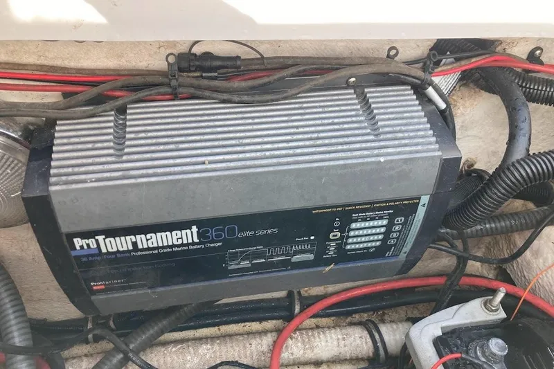 Slide: The Image of ProTournament 360 marine battery charger in 2005 Donzi 35 ZF Daytona boat. - 37