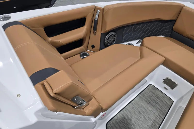 Slide: The Image of Luxurious tan seating in 2026 Four Winns H6 boat interior, featuring modern design and comfort. - 11