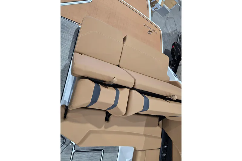Slide: The Image of 2026 Four Winns H6 boat with tan seating and sleek design. - 19