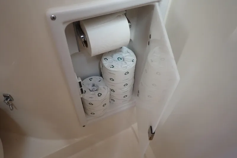 Slide: The Image of Toilet paper storage in Wellcraft 330 Coastal boat, 2006 model. - 106