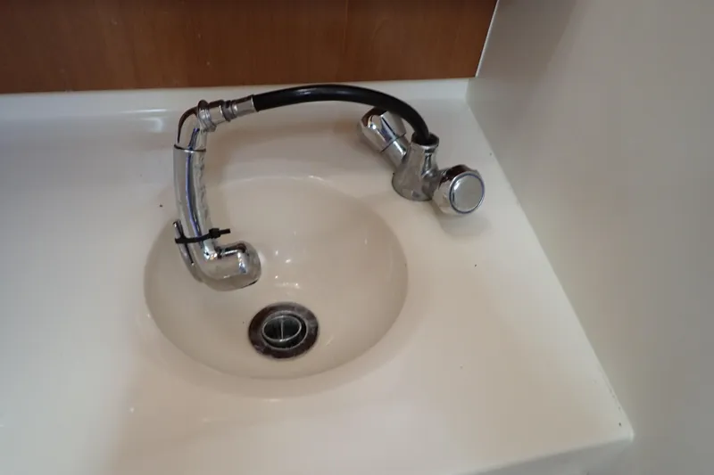 Slide: The Image of Boat sink with chrome faucet in 2006 Wellcraft 330 Coastal. - 108