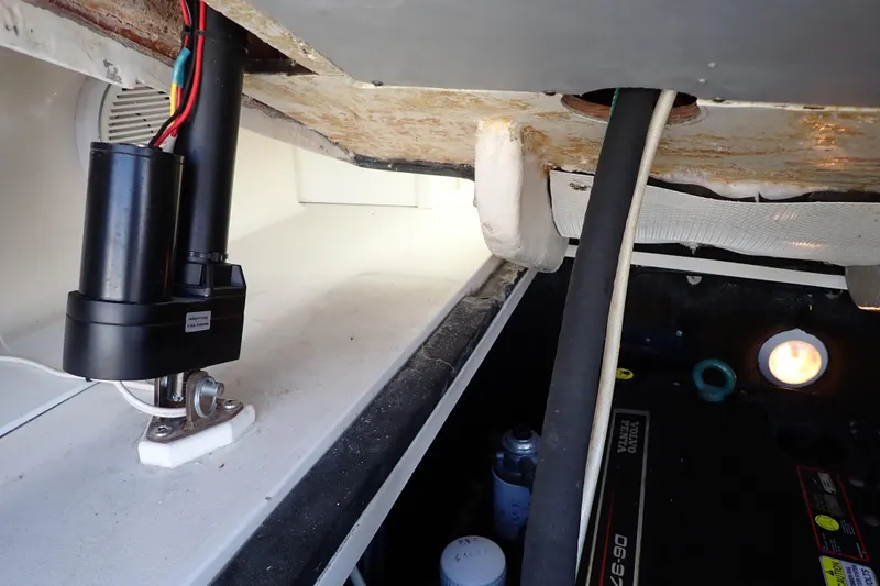 Slide: The Image of Interior view of a 2006 Wellcraft 330 Coastal boat, showcasing wiring and components. - 127