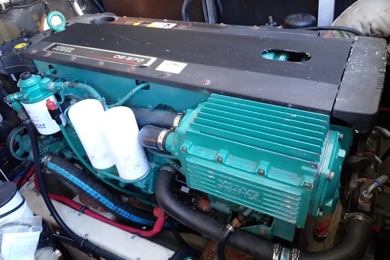 Slide: The Image of 2006 Wellcraft 330 Coastal engine compartment with a Volvo Penta D6-370 marine engine. - 131