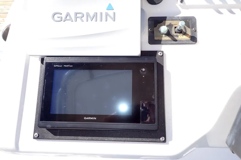 Slide: The Image of Garmin GPS system on 2006 Wellcraft 330 Coastal boat dashboard. - 18