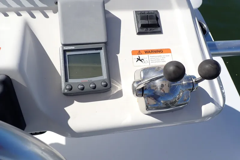 Slide: The Image of Control panel of a 2006 Wellcraft 330 Coastal boat with Raymarine display and throttle. - 20