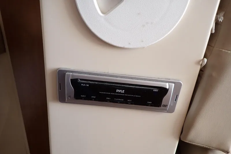 Slide: The Image of Pyle audio system in 2006 Wellcraft 330 Coastal boat interior. - 95