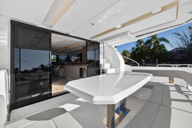 Slide: The Image of Luxurious 2024 Leopard 46 Powercat yacht interior with sleek dining area and modern design. - 10
