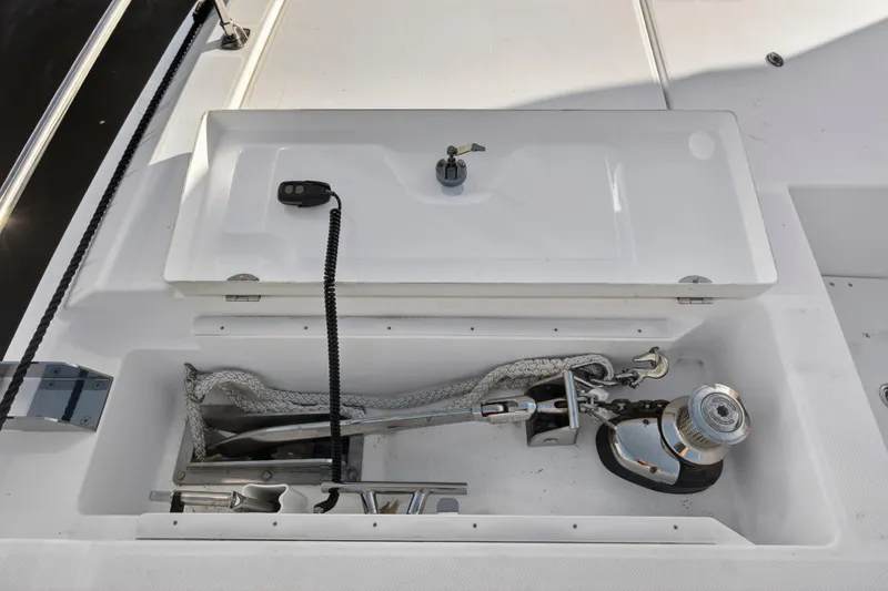 Slide: The Image of 2024 Leopard 46 Powercat anchor locker with winch and rope storage. - 100