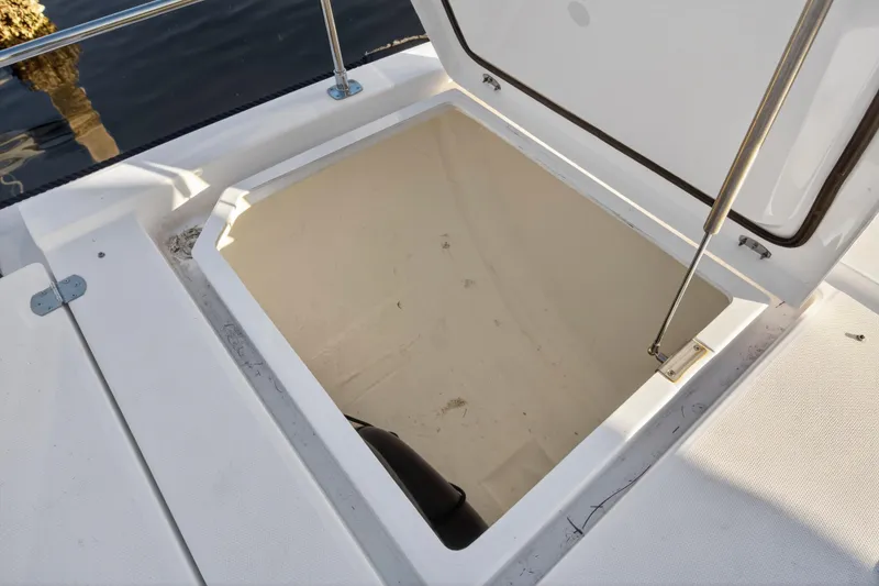 Slide: The Image of Open storage compartment on 2024 Leopard 46 Powercat yacht deck. - 102
