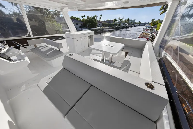 Slide: The Image of Luxurious interior of 2024 Leopard 46 Powercat yacht with spacious seating and modern design. - 25
