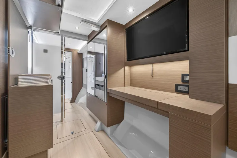 Slide: The Image of 2024 Leopard 46 Powercat interior with modern wood finish and sleek design. - 39