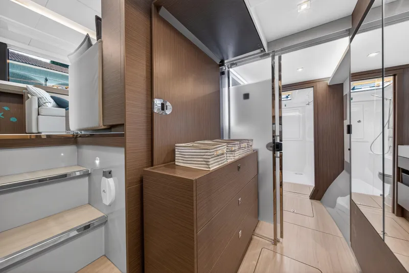 Slide: The Image of Luxurious interior of 2024 Leopard 46 Powercat yacht, featuring modern wood finishes and elegant design. - 41