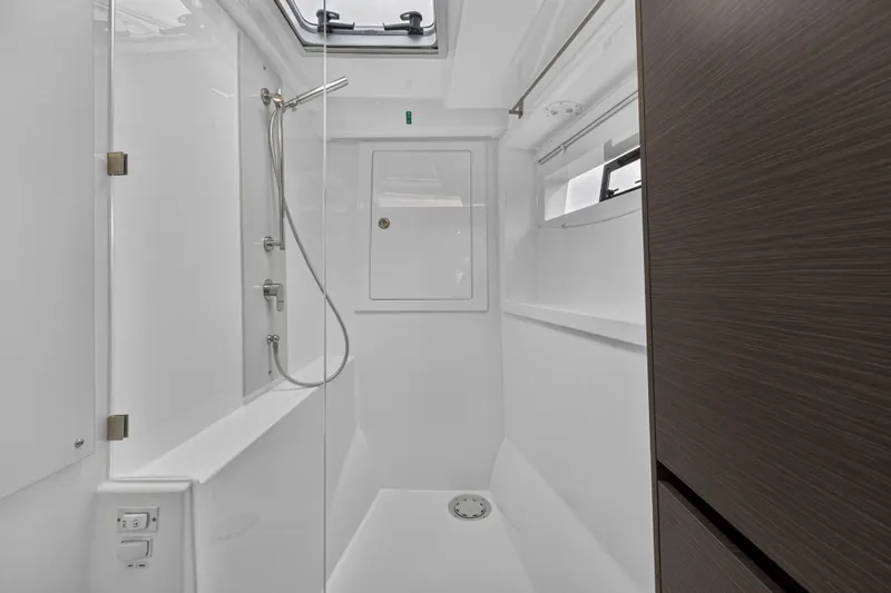 Slide: The Image of 2024 Leopard 46 Powercat shower area with modern fixtures and sleek design. - 47
