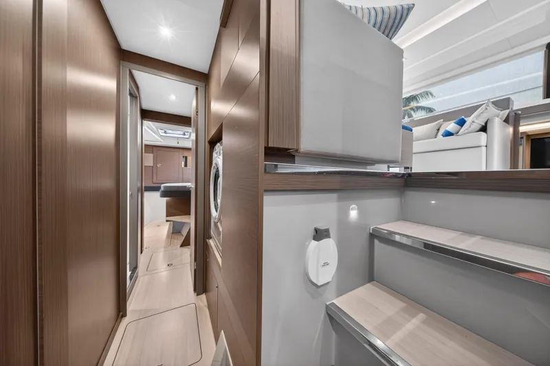 Slide: The Image of Luxurious interior of 2024 Leopard 46 Powercat yacht, featuring modern wood finishes and comfortable seating. - 49