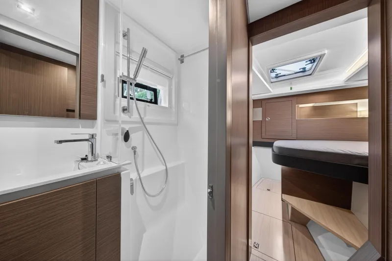 Slide: The Image of Luxurious interior of 2024 Leopard 46 Powercat featuring modern bathroom and cozy cabin. - 55