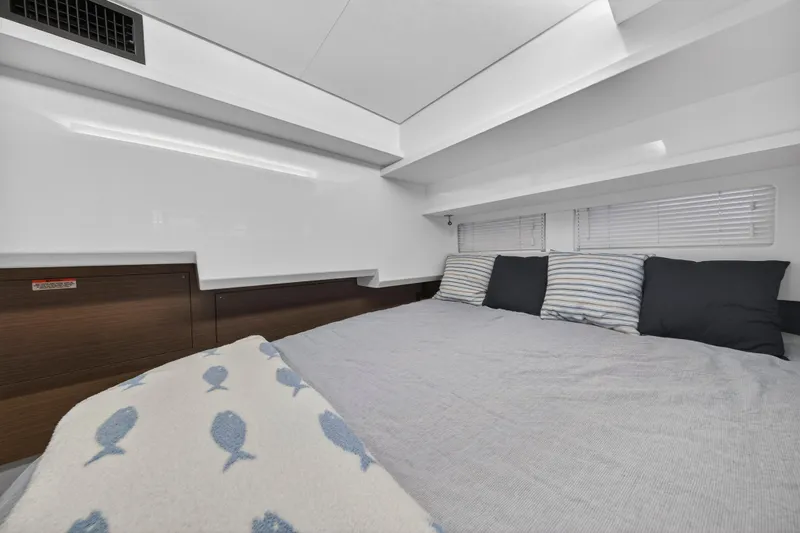 Slide: The Image of Luxurious bedroom interior of 2024 Leopard 46 Powercat yacht with cozy bedding and modern design. - 59