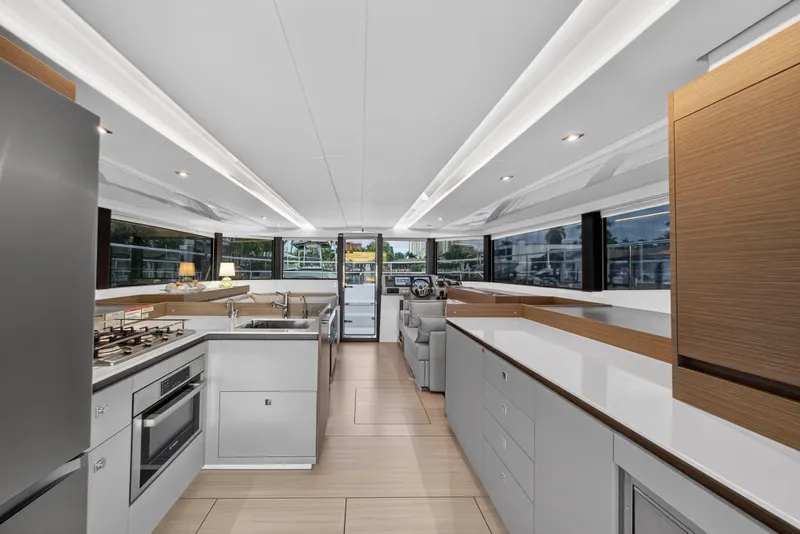 Slide: The Image of Luxurious interior of 2024 Leopard 46 Powercat yacht with modern kitchen and sleek design. - 63