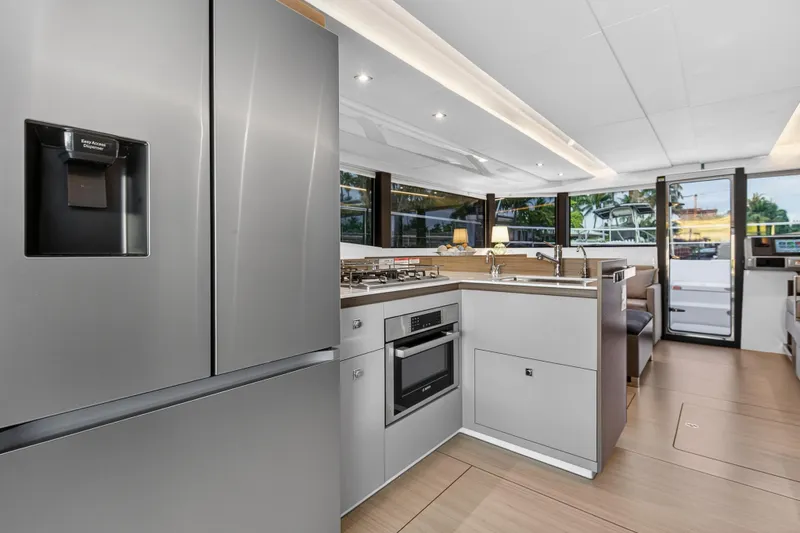 Slide: The Image of Modern kitchen interior on 2024 Leopard 46 Powercat yacht, featuring sleek appliances and ample natural light. - 65