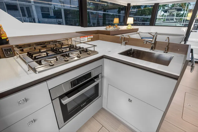Slide: The Image of Modern kitchen in 2024 Leopard 46 Powercat yacht with stove, oven, and sink. - 67