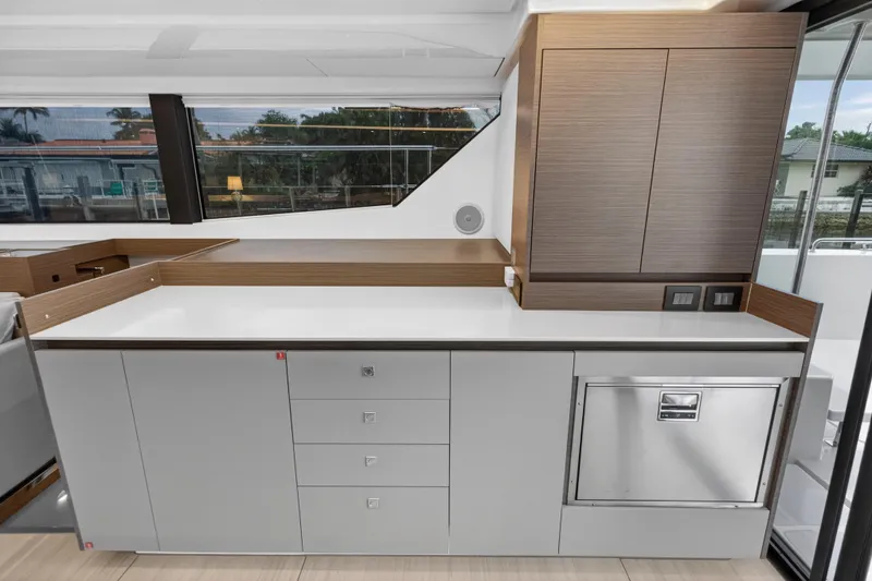 Slide: The Image of Modern kitchen interior on 2024 Leopard 46 Powercat yacht, featuring sleek cabinetry and appliances. - 68