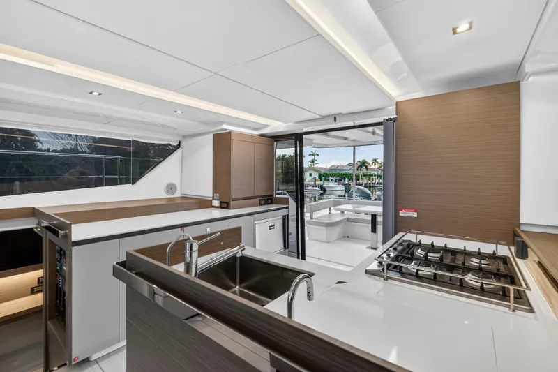 Slide: The Image of Modern kitchen interior of 2024 Leopard 46 Powercat yacht, featuring sleek design and appliances. - 72
