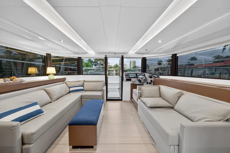 Slide: The Image of Luxurious interior of 2024 Leopard 46 Powercat yacht with modern seating and panoramic windows. - 75