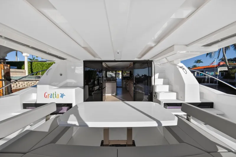 Slide: The Image of 2024 Leopard 46 Powercat yacht interior with sleek design and spacious seating area. - 8