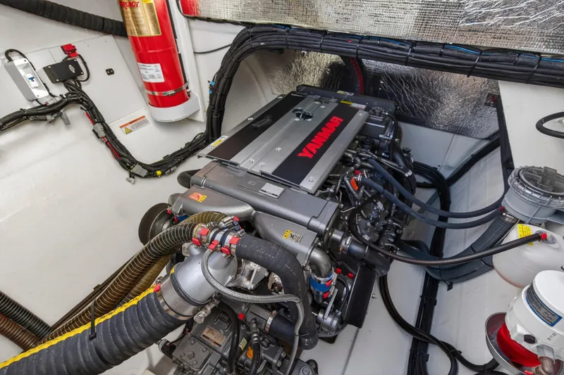 Slide: The Image of Engine room of 2024 Leopard 46 Powercat with Yanmar engine and fire extinguisher. - 94