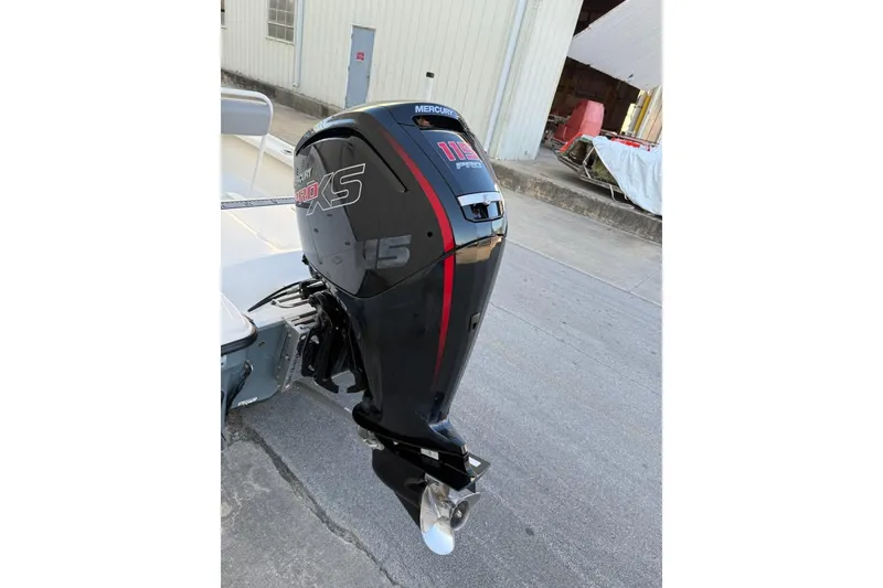 Slide: The Image of 2024 Mako 18 LTS boat with Mercury Pro XS 115 outboard motor. - 14