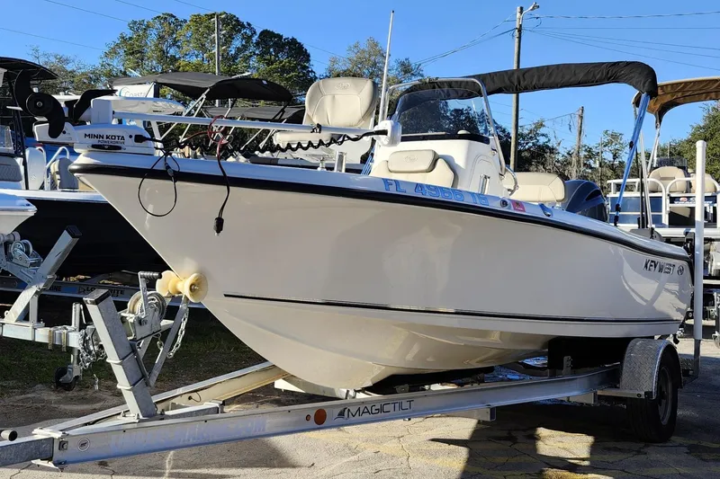 Slide: The Image of 2022 Key West 189 FS boat on trailer, featuring Minn Kota trolling motor. - 3