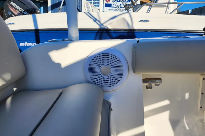 Slide: The Image of 2022 Key West 189 FS boat interior with speaker and seating detail. - 31