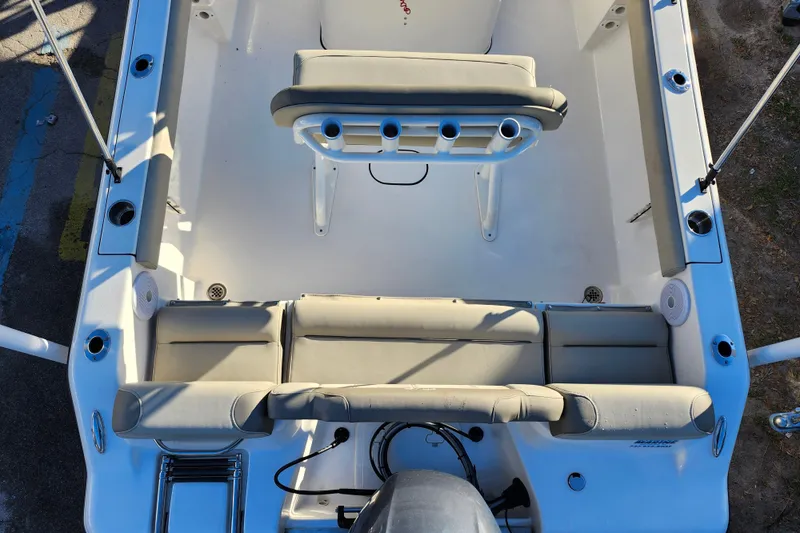 Slide: The Image of 2022 Key West 189 FS boat interior with seating and rod holders. - 35