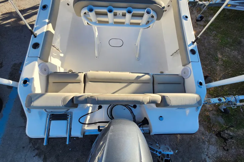 Slide: The Image of 2022 Key West 189 FS boat interior with seating and rod holders. - 38