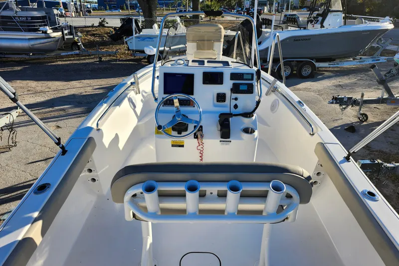 Slide: The Image of 2022 Key West 189 FS boat interior with steering console and seating. - 40