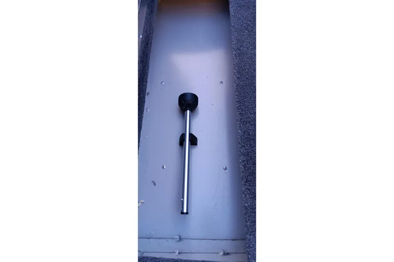 Slide: The Image of 2026 Tracker Pro 170 boat interior with mounted rod holder. - 16