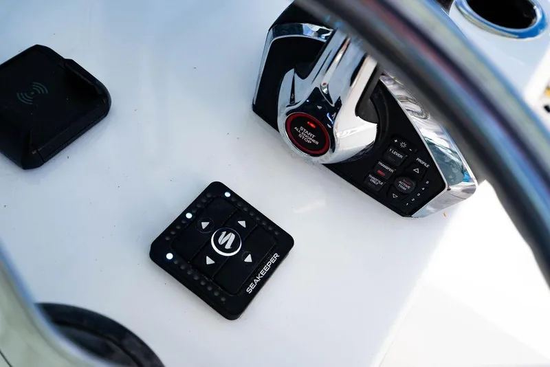 Slide: The Image of Control panel of 2026 Reef Runner 280 boat with Seakeeper system. - 21