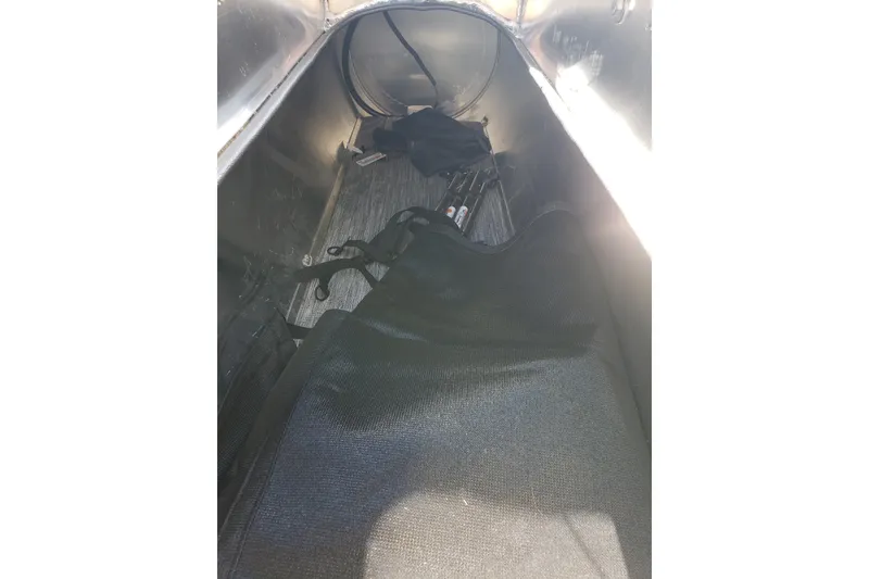 Slide: The Image of Interior storage compartment of 2026 Bentley Pontoons Elite 253 Swingback Bench. - 16