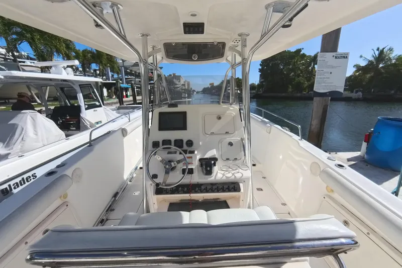 Slide: The Image of 2006 Century 3200 Center Console boat interior with steering wheel and control panel. - 24