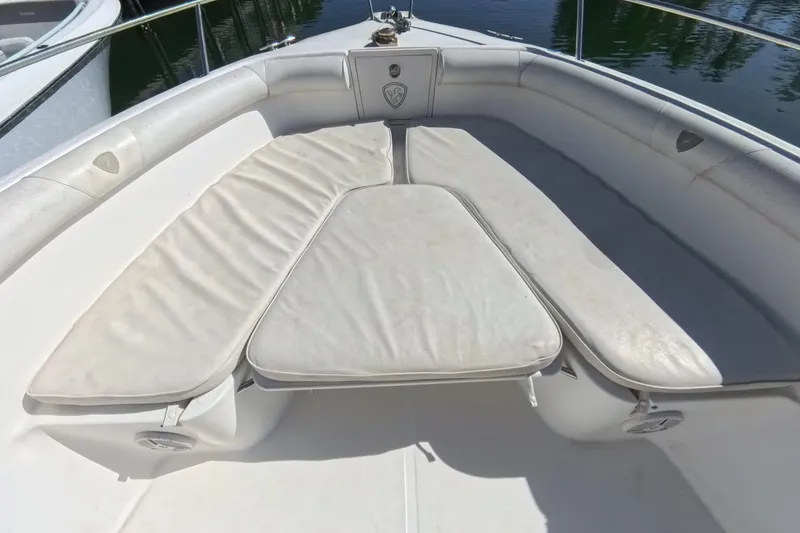 Slide: The Image of 2006 Century 3200 Center Console boat with cushioned seating area. - 31
