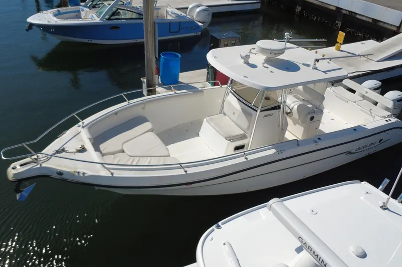 Slide: The Image of 2006 Century 3200 Center Console boat docked in marina, aerial view. - 8