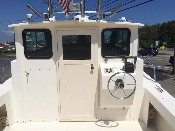 Slide: The Image of Parker Marine 2520 Deep Vee Sport Cabin 1999 - 2