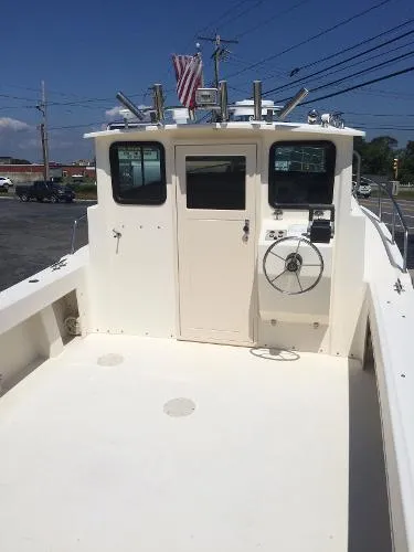 Slide: The Image of Parker Marine 2520 Deep Vee Sport Cabin 1999 - 3