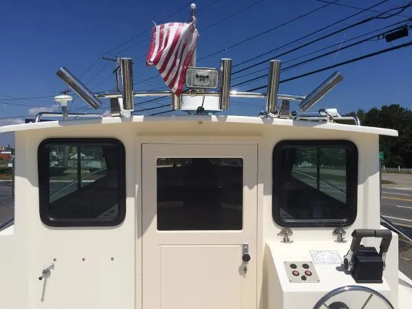 Slide: The Image of Parker Marine 2520 Deep Vee Sport Cabin 1999 - 4