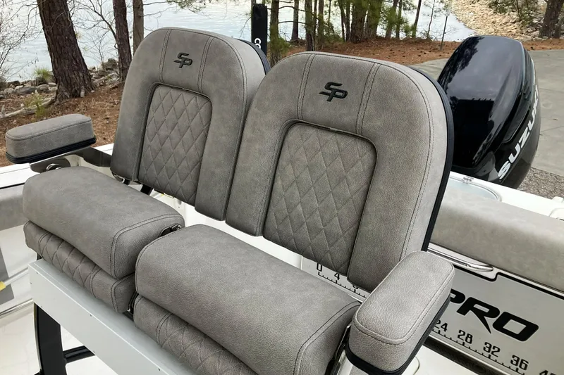 Slide: The Image of 2022 Sea Pro 239 Deep V CC boat seats with diamond stitching and armrests. - 9