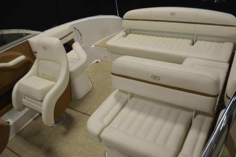 Slide: The Image of 2015 Cobalt R3 boat interior with luxurious beige seating and modern design. - 4