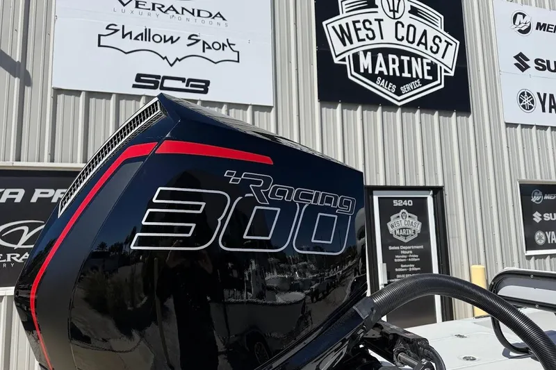 Slide: The Image of 2026 SCB R24 Racing 300 engine at West Coast Marine dealership. - 13