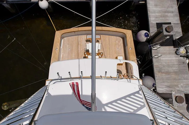 Slide: The Image of Aerial view of a 1987 Custom Carolina Merritt yacht at dock. - 11