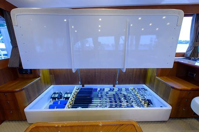 Slide: The Image of Fishing rod storage on 1987 Custom Carolina Merritt boat. - 32